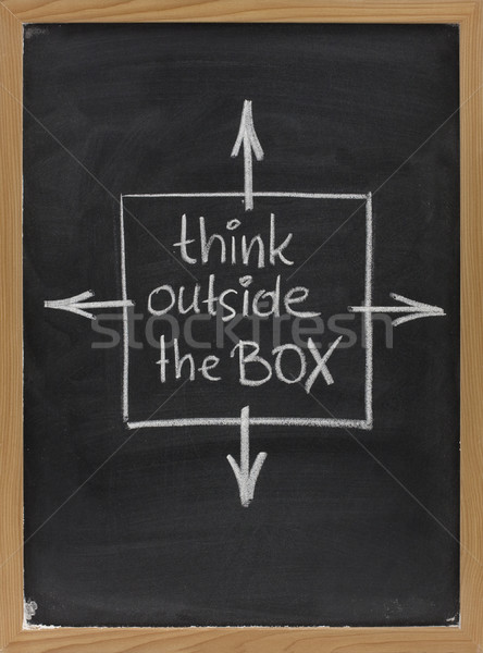 think outside the box phrase on blackboard Stock photo © PixelsAway