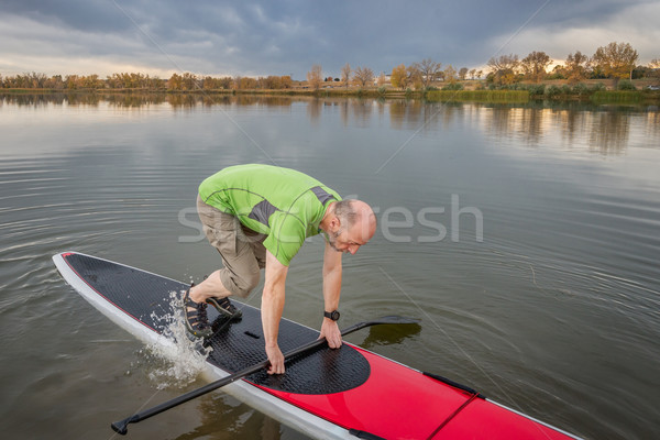 fitness on stand up paddleboard Stock photo © PixelsAway