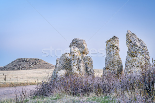 Rocas pradera anochecer formación de roca temprano Foto stock © PixelsAway