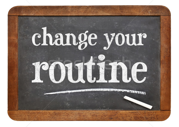 change your routine blackboard sign Stock photo © PixelsAway