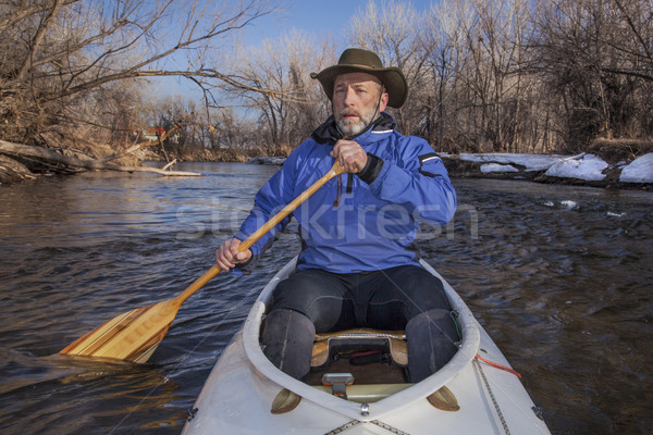 senior canoe paddler Stock photo © PixelsAway