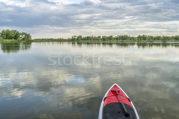 stand up paddleboard on lake Stock photo © PixelsAway