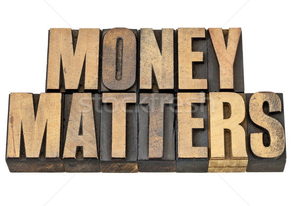 money matters in wood type Stock photo © PixelsAway