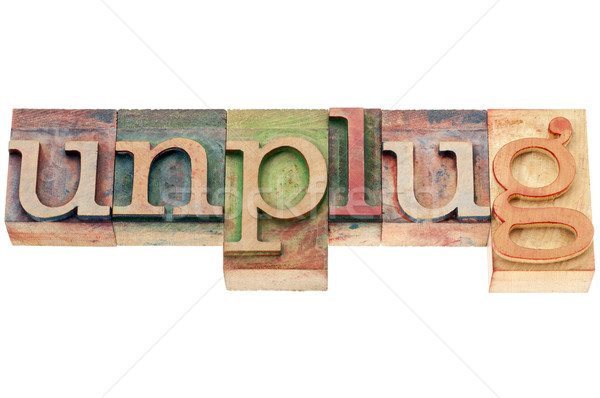unplug word in wood type Stock photo © PixelsAway