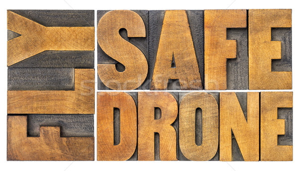 fly safe drone word abstract in wood type Stock photo © PixelsAway