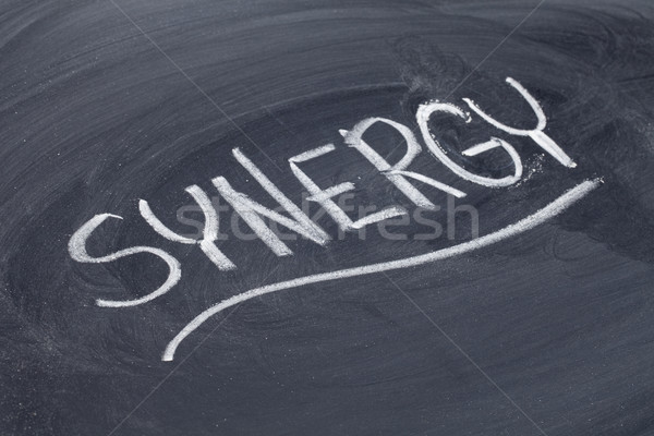 synergy word on blackboard Stock photo © PixelsAway