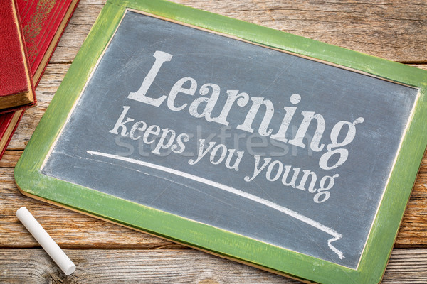 learning keeps you young on blackboard Stock photo © PixelsAway