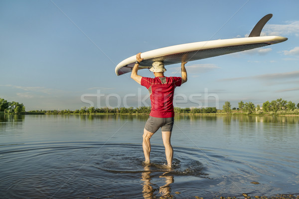 launching stand up paddleboard Stock photo © PixelsAway
