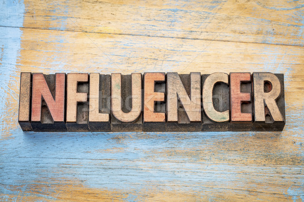 influencer word in wood type Stock photo © PixelsAway