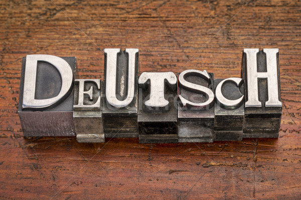 Deutsch word in metal type Stock photo © PixelsAway