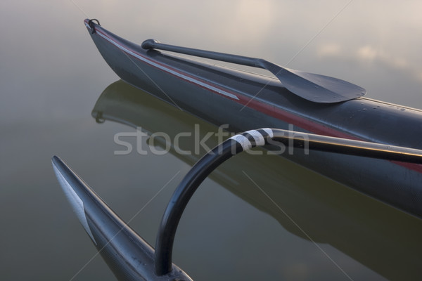 bent shaft paddle and racing outrigger canoe Stock photo © PixelsAway