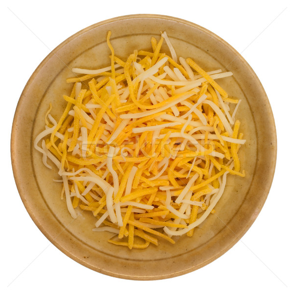 Cheddar queso pequeño cerámica tazón aislado Foto stock © PixelsAway