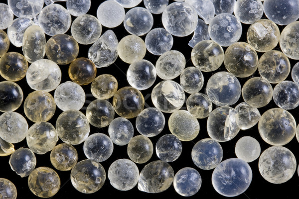 moisture adsorbing silica gel beads on black Stock photo © PixelsAway