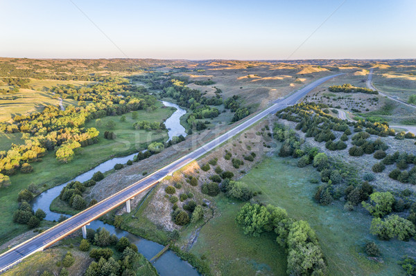 Widok z lotu ptaka rzeki autostrady most piasku wzgórza Zdjęcia stock © PixelsAway