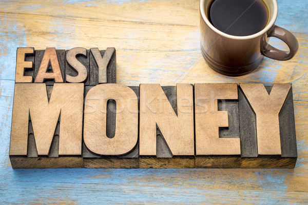 easy money word abstract in letterpress wood type Stock photo © PixelsAway