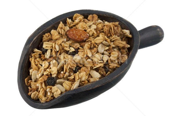 scoop of granola with nuts, seeds and raisins Stock photo © PixelsAway