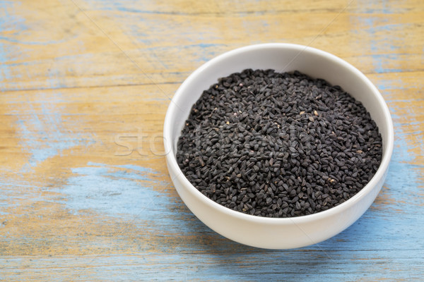 Schwarz Kreuzkümmel Samen weiß Keramik Schüssel Stock foto © PixelsAway