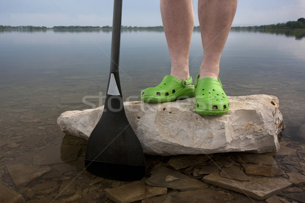 green clogs and canoe paddle Stock photo © PixelsAway