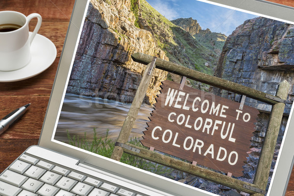 Colorado welcome sign on laptop Stock photo © PixelsAway