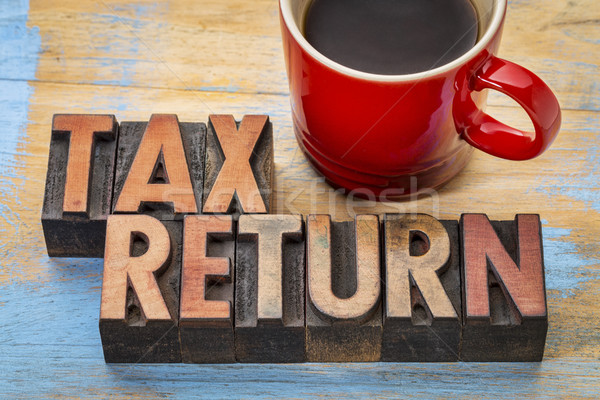 Stock photo: tax return word abstract in wood type
