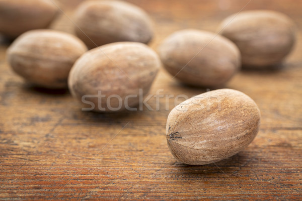 pecan nuts on grunge wood Stock photo © PixelsAway