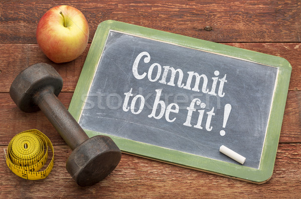 Commit to be fit - concept on blackboard Stock photo © PixelsAway