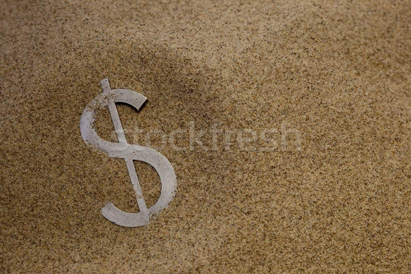 Stock photo: dollar in desert sand
