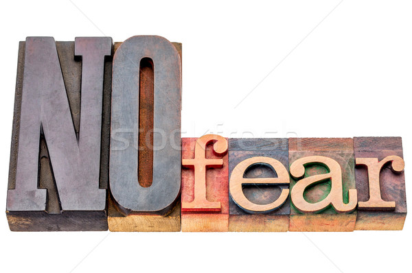 NO fear word abstract in wood type Stock photo © PixelsAway