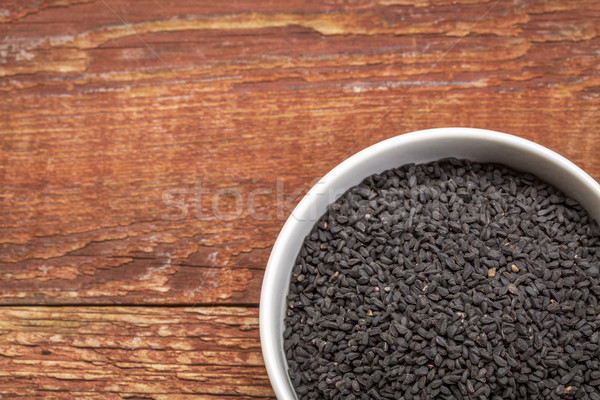 Siyah kimyon tohumları küçük çanak rustik Stok fotoğraf © PixelsAway