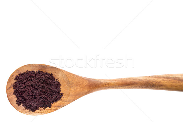 acai berry powder on wooden spoon Stock photo © PixelsAway