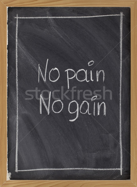 no pain, no gain exercise motto on blackboard Stock photo © PixelsAway