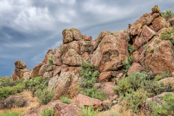 Grès formation rocheuse orageux ciel aigle nid Photo stock © PixelsAway