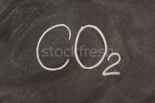 chemical symbol for carbon dioxide on a blackboard Stock photo © PixelsAway