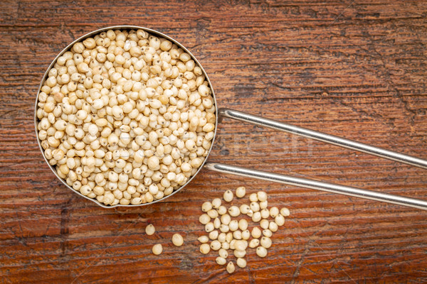 white sorghum grain in a metal scoop Stock photo © PixelsAway