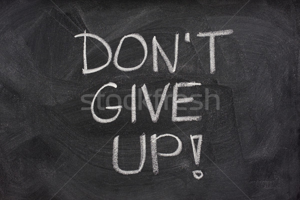 don't give up phrase on blackboard Stock photo © PixelsAway