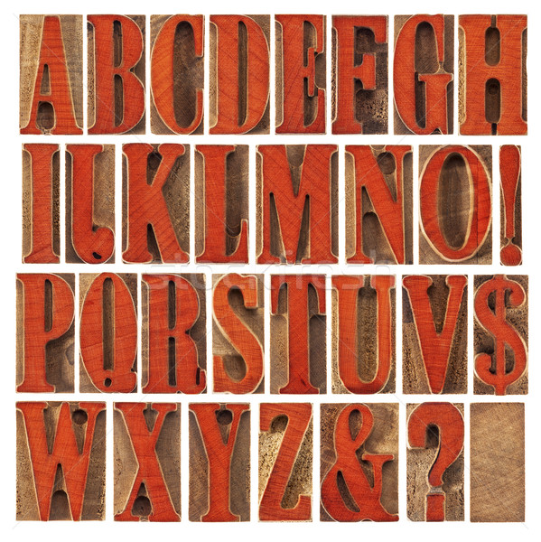 wood type alphabet stained by red Stock photo © PixelsAway