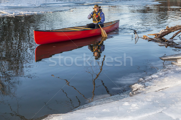 canoe paddling in winter Stock photo © PixelsAway