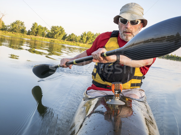 paddling a  fast kayak Stock photo © PixelsAway