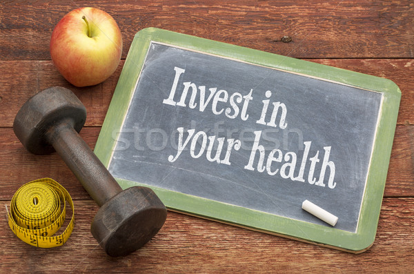 Invest in your health advice on blackboard Stock photo © PixelsAway