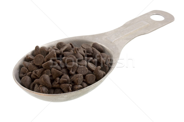 Measuring tablespoon of chocolate morsels Stock photo © PixelsAway