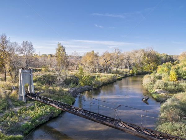 Stock photo: old irrigation aqueduct acroos river