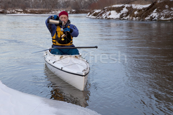 winter canoe - break for hot tea Stock photo © PixelsAway