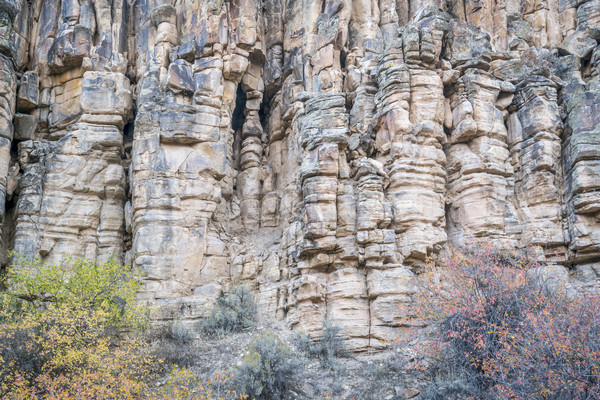 Stock photo: sandstone cliff with columns and pillars