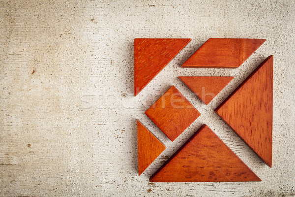Stock photo: wooden tangram puzzle