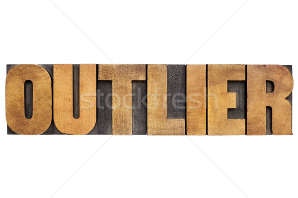 outlier word in wood type Stock photo © PixelsAway