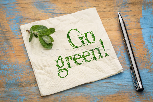 Stock photo: Go green message on napkin