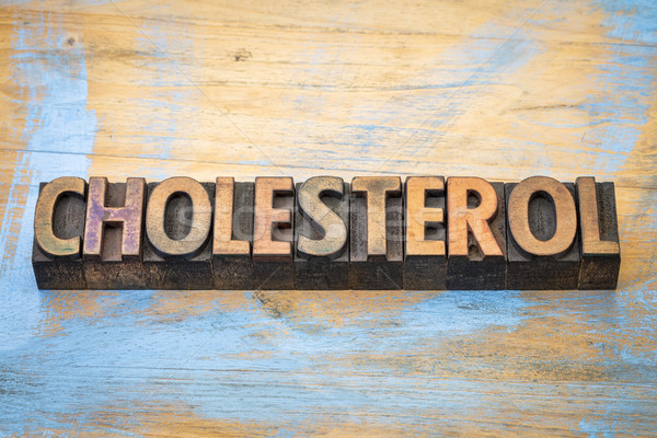 Colesterolului cuvant abstract lemn tip epocă Imagine de stoc © PixelsAway