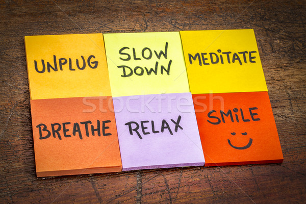 unplug, slow down, meditate, breathe, relax, smile concept Stock photo © PixelsAway
