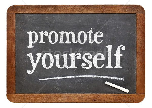 promote yourself blackboard sign Stock photo © PixelsAway