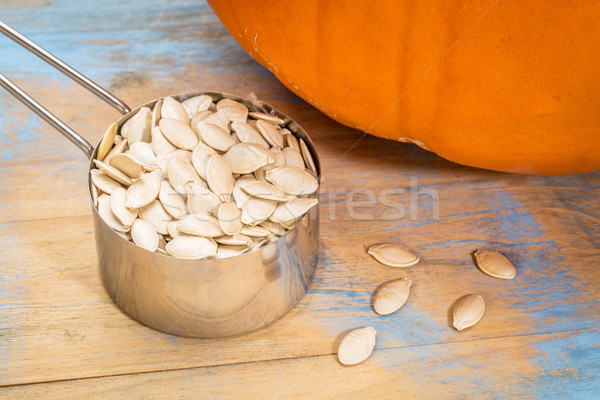 scoop of pumpkin seeds Stock photo © PixelsAway